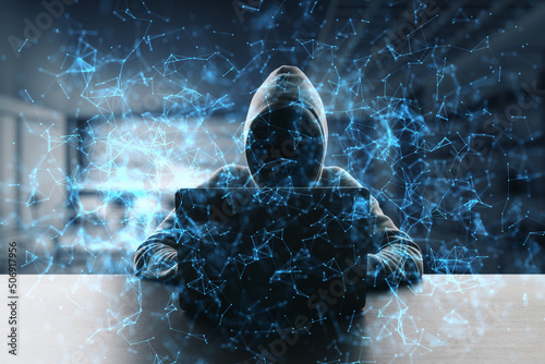 Fototapeta Naklejka Na Ścianę i Meble -  Personal data theft and hacking concept with abstract digital metaverse wallpaper and dark hacker in hoody silhouette using laptop on abstract dark office background, dpuble exposure