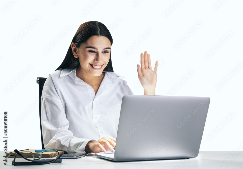 Communication concept with young pretty woman chating with collegue via online video service by laptop isolated on white wall background, close up Communication concept with young pretty woman chating with collegue via online video service by laptop isolated on white wall background, close up