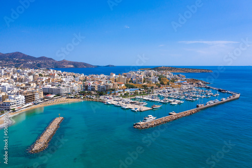 Fototapeta Naklejka Na Ścianę i Meble -  Agios Nikolaos,  a picturesque coastal town with colorful buildings around the port in the eastern part of the island Crete, Greece