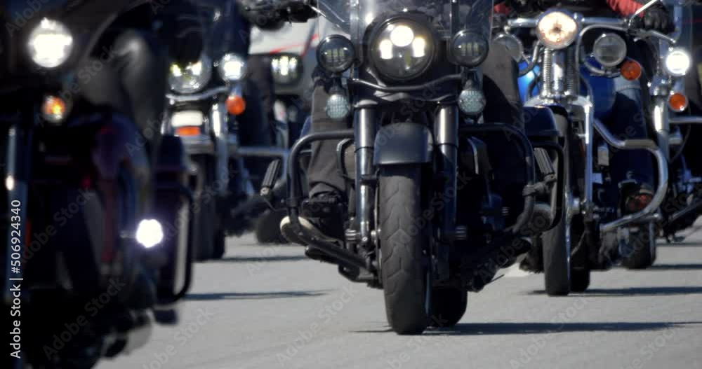 4K - Column of bikers riding on the road