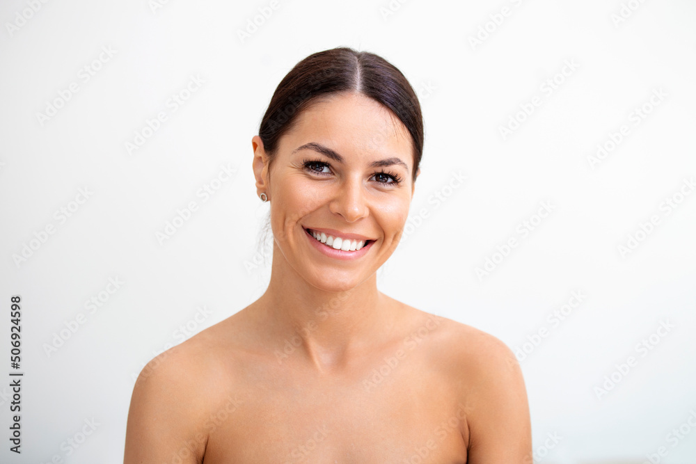 Young pretty Woman getting special skin treatment. Beautiful Girl applying serum. Isolated on white background. Smooth skin without wrinkles. Young pretty Woman getting special skin treatment. Beautiful Girl applying serum. Isolated on white background. Smooth skin without wrinkles.