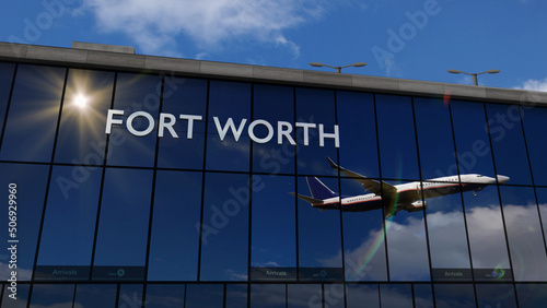 Airplane landing at Fort Worth, Dallas Texas, USA airport mirrored in terminal photo