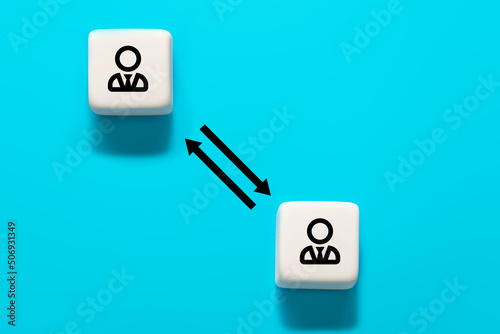 Cube with worker icon and exchange arrow. Share, network, peer to peer concept. Job rotation or staff turnover icon.