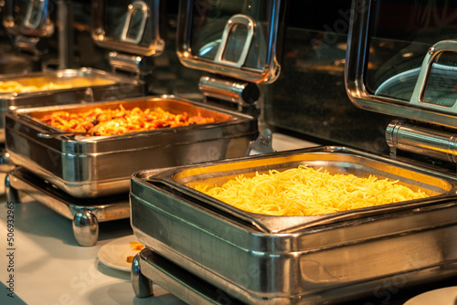 Buffet heated trays ready for service with pasta choice for breakfast