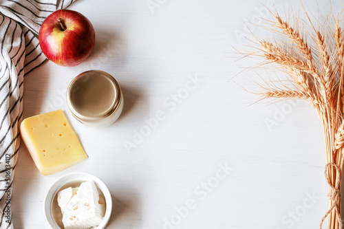 Wheat ears and fresh diary milk products photo