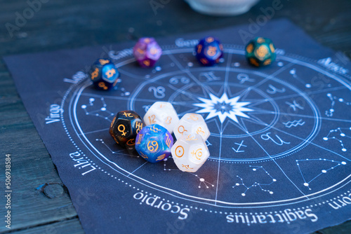 Zodiac horoscope with divination dice photo