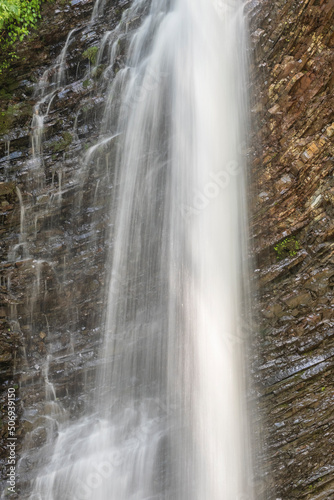 Fototapeta Naklejka Na Ścianę i Meble -  wall of water flows from waterfall in mountains