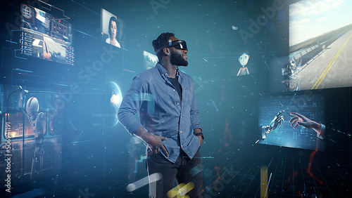 African American man in the cyberspace of the virtual world of the meta universe uses the interfaces of different applications. photo