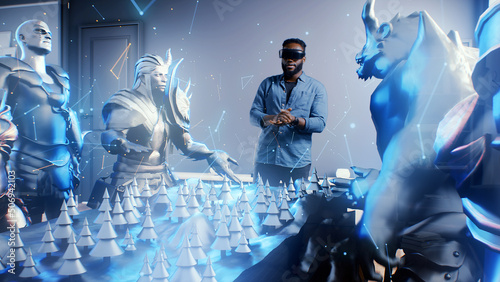 Fotografia Afro american gamer puts on vr goggles and emotionally discusses with holographi