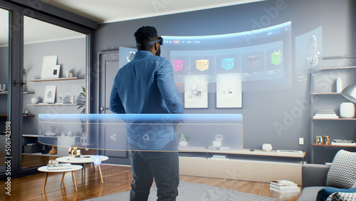 Принти на полотні African American man wearing VR glasses uses NFT interface in virtual cyberspace