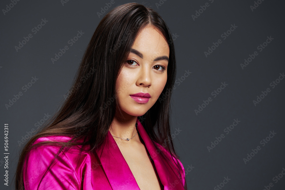 portrait woman in a pink dress luxury close-up bright makeup isolated background portrait woman in a pink dress luxury close-up bright makeup isolated background