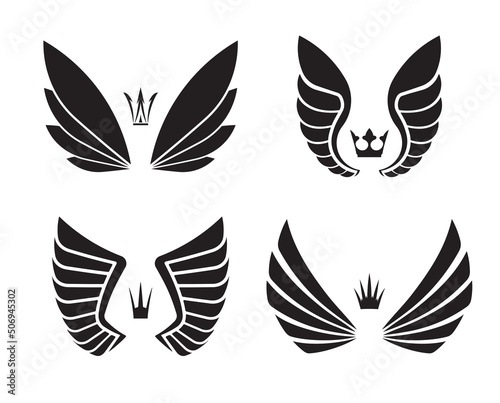 Set of four pairs of wings with crowns..