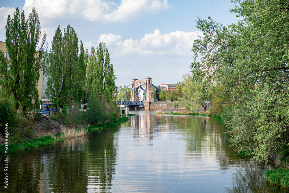 View of the river and bridge. Spring landscape. Bridge over the river Odra. Grunwald Bridge View of the river and bridge. Spring landscape. Bridge over the river Odra. Grunwald Bridge