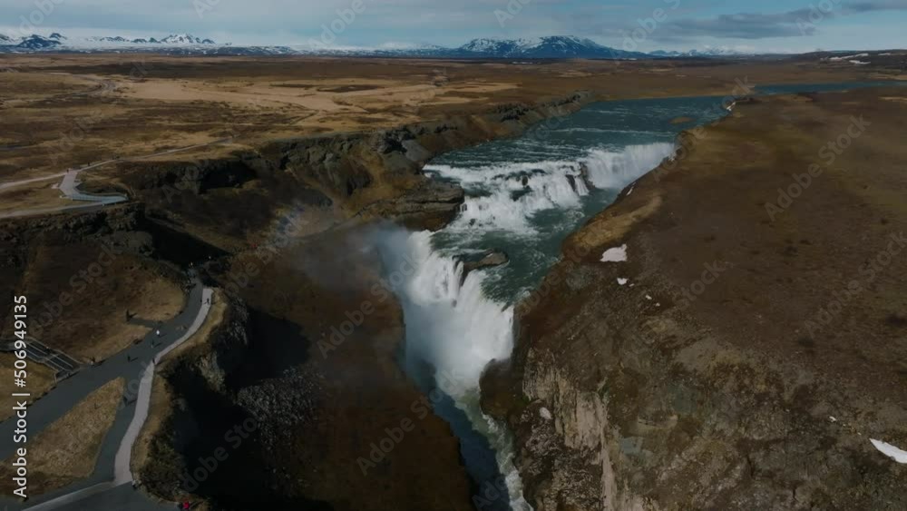 Panoramic aerial view of popular tourist destination - Gullfoss waterfall. Dramatic spring on Hvita river. Beautiful Iceland, Europe. Traveling concept background. Panoramic aerial view of popular tourist destination - Gullfoss waterfall. Dramatic spring on Hvita river. Beautiful Iceland, Europe. Traveling concept background.