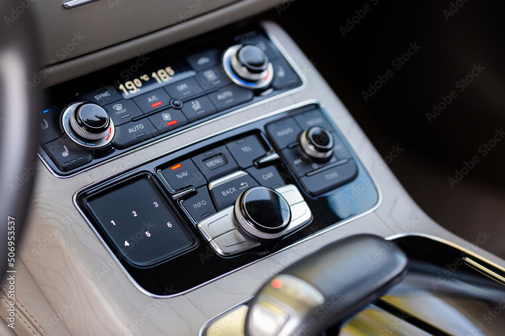 Close-up of the accelerator handle, radio, navigator and other setting buttons. Close-up of the accelerator handle, radio, navigator and other setting buttons.
