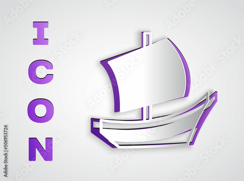 Paper cut Egyptian ship icon isolated on grey background. Egyptian papyrus boat. Paper art style. Vector