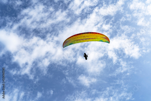 A paraglider in the sky over the Puy de Dome Volcanoes Regional Park of Auvergne  France.