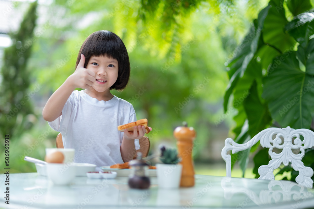 Kid eating food, happy time, breakfast
Kid eating food, happy time, breakfast