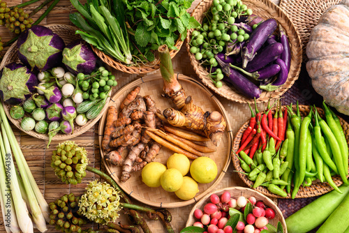 Fototapeta Naklejka Na Ścianę i Meble -  Organic Southeast Asian vegetables and spices from local farmer market in Thailand, Sustainability concept, Table top view