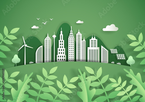 Building paper art, windmills, solar cells and leaves, concept of city and nature.