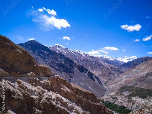 nature scenic landscape of cold desert with snow capped mountains or peaks of high and incredible Himalayas at spiti valley himachal pradesh india