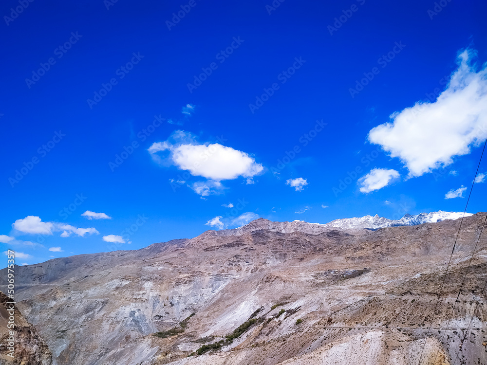 Spiti Valley with blue sky and clouds in Himachal Pradesh, India