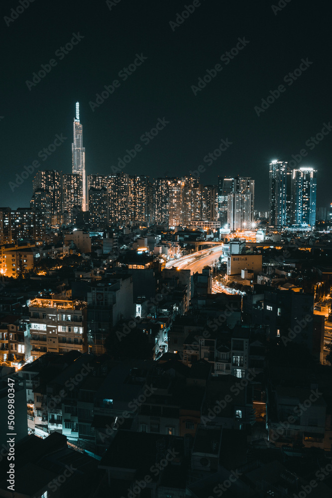 Nightscape of Ho Chi Minh City, it is the most populous city in Vietnam. Saigon skyline. View of City Garden Boulevard Tower (Chung cu City Garden)
