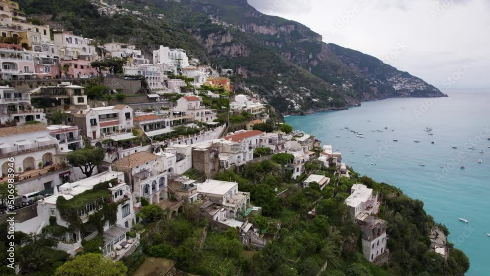 Well-known Town Of Positano And Placid Coast Of Amalfi In Italy. Aerial Ascend Well-known Town Of Positano And Placid Coast Of Amalfi In Italy. Aerial Ascend