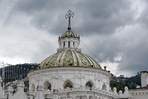 Green tile dome on the roof of La Compania Church in the Old Town, Quito, Ecuador