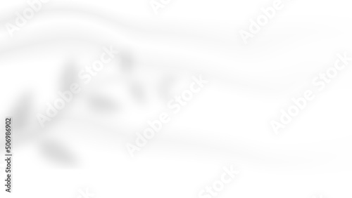 abstract blank white soft creased satin fabric folding texture with leaves shadow background for organic cosmetic product backdrop and decorative graphic design 