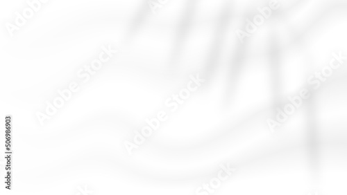 abstract blank white soft creased satin fabric folding texture with leaves shadow background for organic cosmetic product backdrop and decorative graphic design 