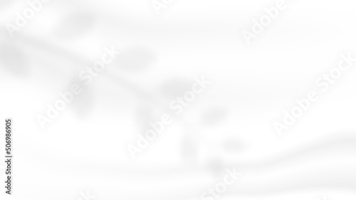 abstract blank white soft creased satin fabric folding texture with leaves shadow background for organic cosmetic product backdrop and decorative graphic design 