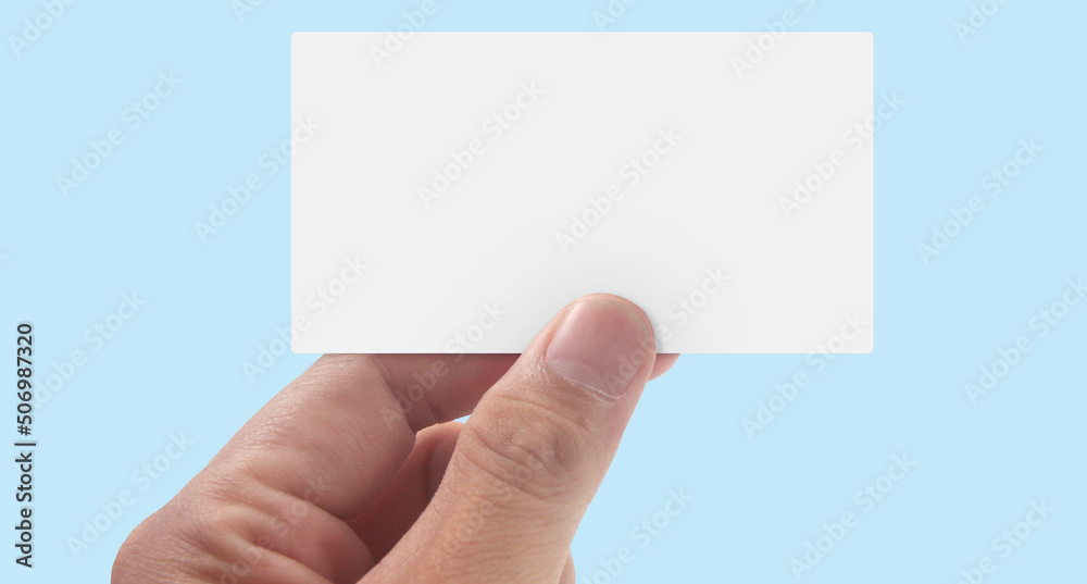 Fototapeta premium Close up of hand holding virtual card