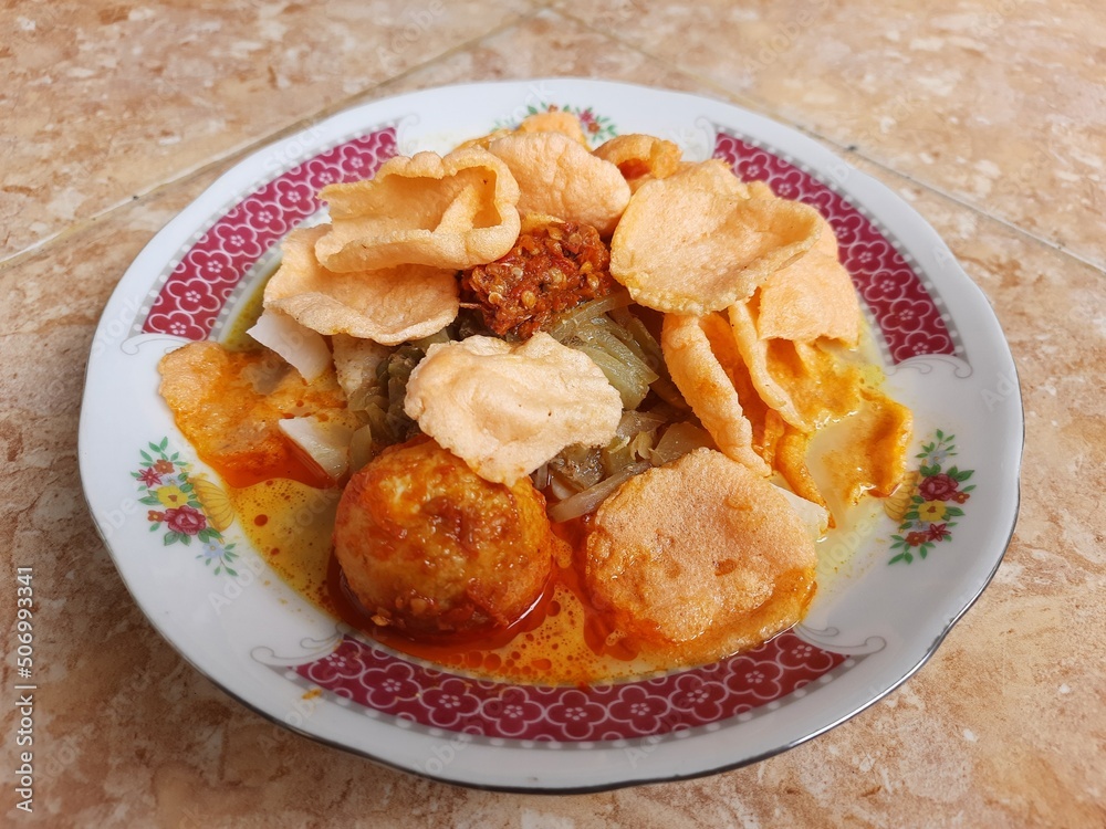 Lontong sayur or vegetable curry with rice pressed cake is an Indonesian traditional rice dish