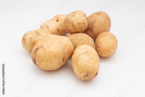 Fresh potato on white background