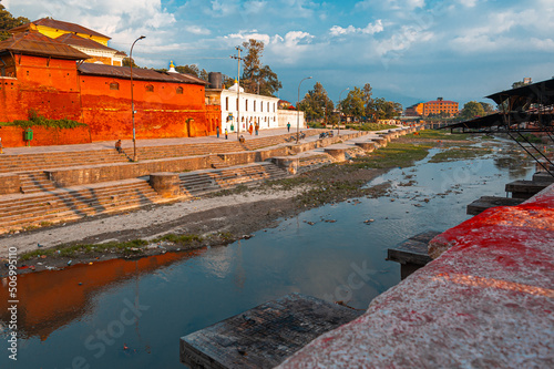 Stairs and Terraces of the South Baghmati River in Kathmandu near the Pashupatinath Temple. It is here that the bodies of ordinary mortals are burned. Along the river are pedestals for the cremation o photo