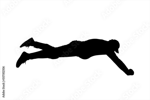 A guy in a cap, sneakers, and tracksuit lies on his stomach, face down. The character is trying to reach for something, and pull it out. Rescuer. Rescue operation. Male silhouette isolated on white