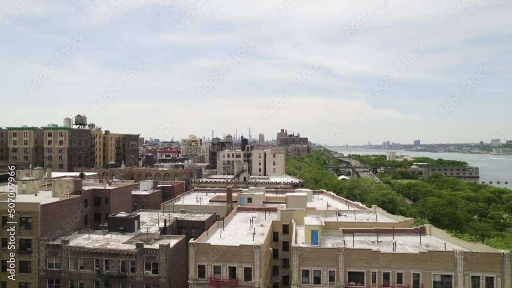 Overhead drone clip of apartment buildings and rooftops in Harlem, Manhattan, New York City Overhead drone clip of apartment buildings and rooftops in Harlem, Manhattan, New York City