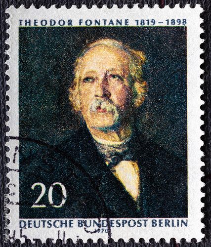Germany, Berlin - circa 1970 : cancelled postage stamp printed by Germany, Berlin, that shows portrait of Theodor Fontane 1819-1898 , 150th birthday anniversary, circa 1970. photo