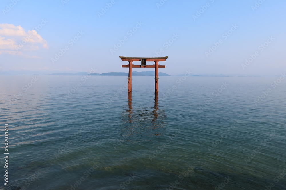 The torii of Shirahige-jinjya Shrine which stands in the water of Biwa-ko Lake in Takashima City in Shiga Prefecture in Japan 日本の滋賀県高島市にある白髭神社の琵琶湖中に立つ鳥居