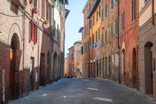 colorful street view of siena city, italy