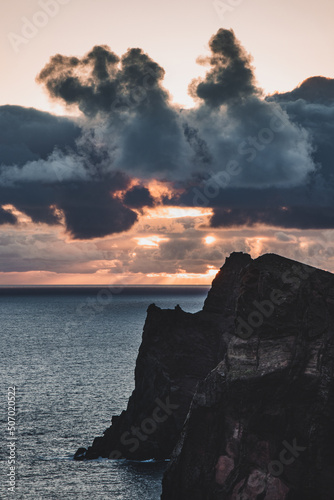 Beautiful wild nature surrounded by large cliffs in the area of ponta de sao lourenco on the northeast of the island of Madeira in Portugal. Tourist destination of Portugal. Sunset over cliffs