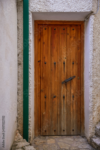 light-colored rustic wooden door