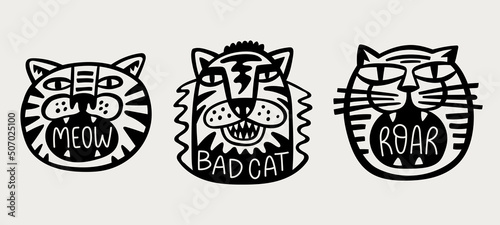 Styled trendy black roaring animal heads. Cute cat and tiger hand drawn characters.