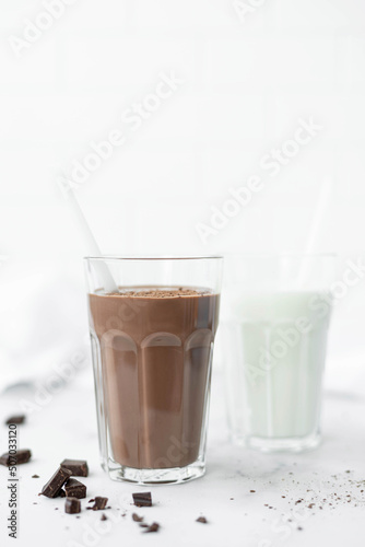 milk chocolate cocktail with chocolate pieces in a glass cup © Ольга Гагарова