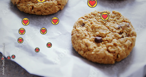 Image of hearts floating over cookies on cooking paper