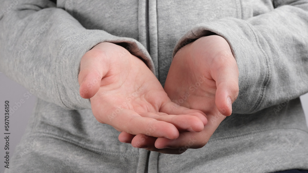 Fototapeta premium Palm of hands holding, giving, receiving something.