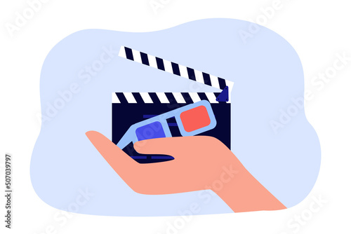 Hand holding clapperboard and 3D glasses. Clapper board and red and blue glasses as symbol of cinema flat vector illustration. Cinema, entertainment, film industry concept for banner or landing page