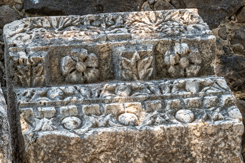 Close up of carved architectural feature at the ruins of Capernaum in Israel other names Kfar Nahum or Capharnaum.
