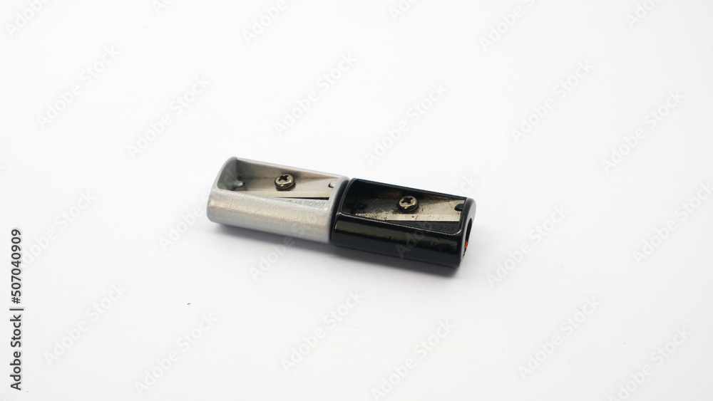Metal Pencil Sharpener Isolated on White Background with copy space Metal Pencil Sharpener Isolated on White Background with copy space
